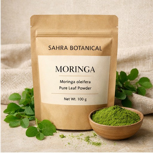 Moringa Sahra Botanical — sachet kraft avec poudre verte et feuilles fraîches de moringa